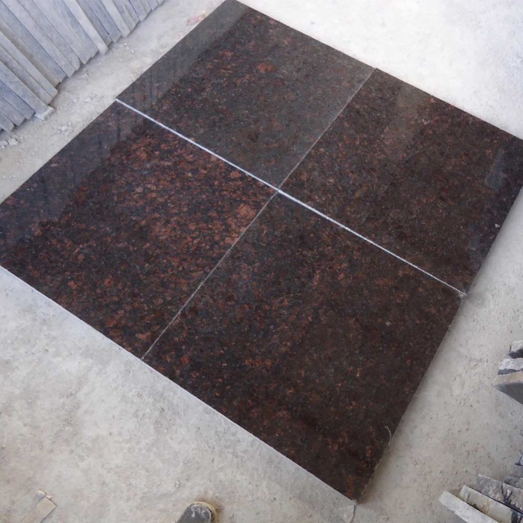 Granite floor tiles for having a traffic friendly surface
