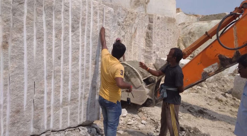 Ivory white granite rough block inspection