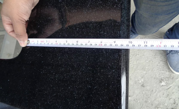 Quality inspection of black galaxy granite